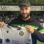 Charlie Austin signs for Hungerford Town.